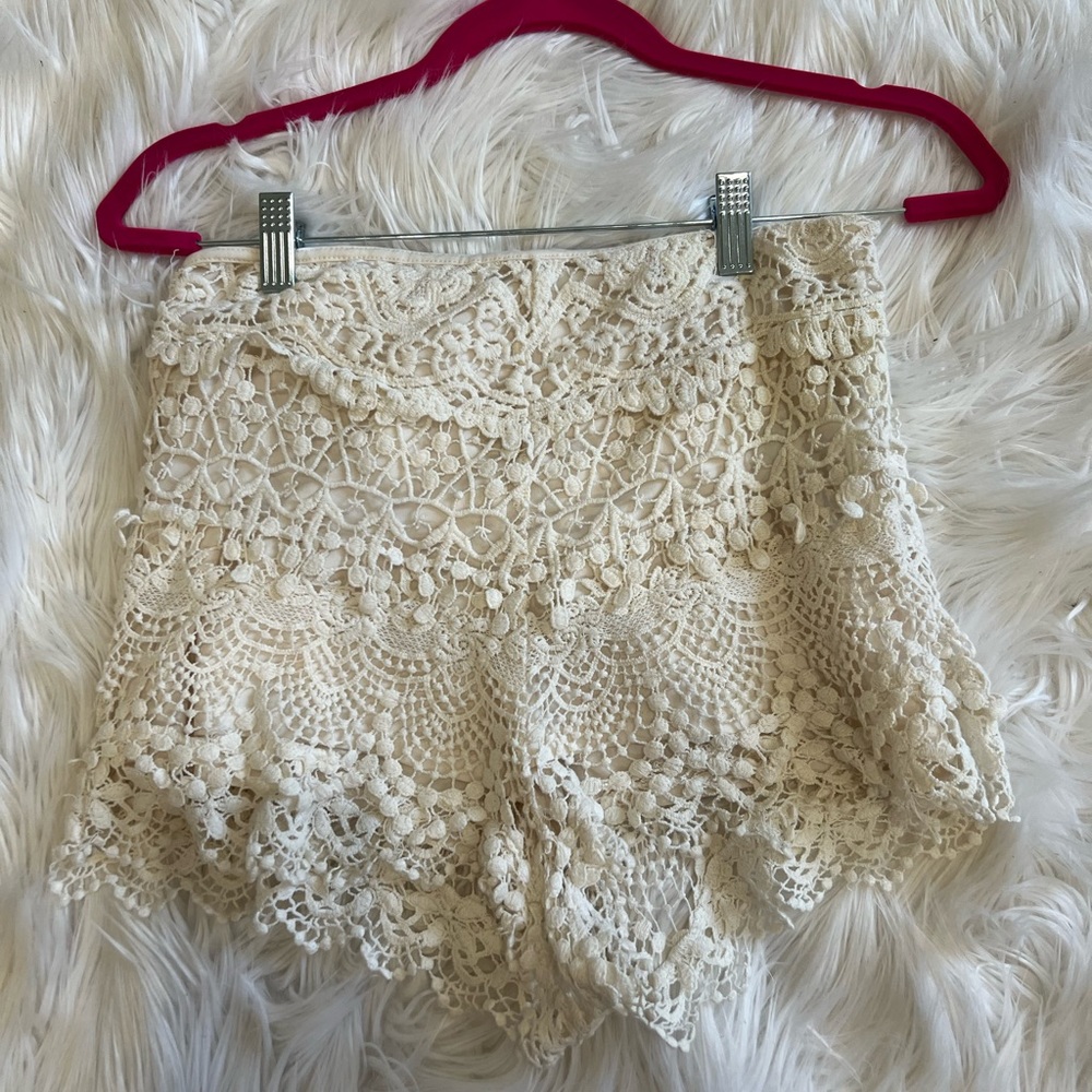 Cream colored printed shorts